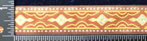 Long Diamond Geometric Wide Trim - Silver/Curry on Red