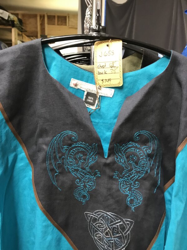 J658 - Turquoise Linen Short Sleeve Tunic, Black Yoke, Dragon & Celtic Knot w/Trinity Embroidery, Brown Trim