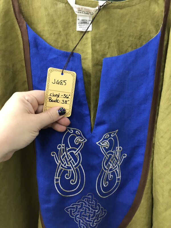 J685 - Dusky Olive Short Sleeve Linen Tunic, Medium Blue Bib w/Celtic Ferret & Square Celtic Knot Embroidery, Medium Brown Edging