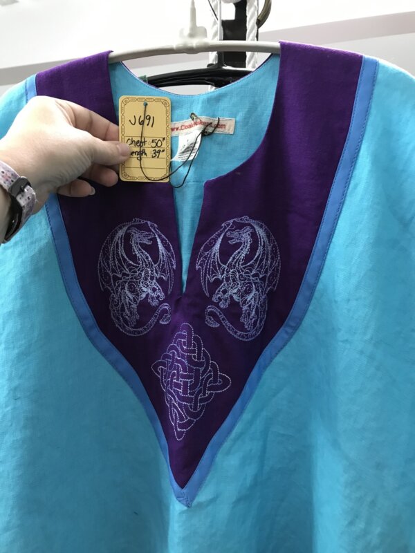 J691 - Turquoise Blue Linen Short Sleeve Tunic, Purple Yoke w/Doodle Dragon & Celtic Knot Embroidery, Cornflower Blue Edging